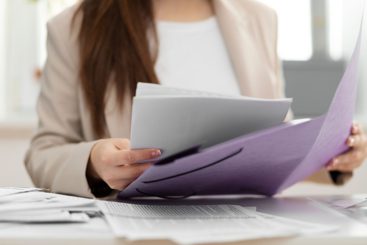 young-adult-organizing-documents