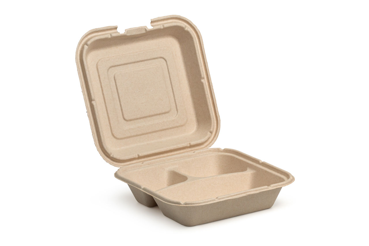 Molded pulp or fiber clamshell takeout container made of eco-friendly, biodegradable material and has a hinged design that allows to open or close to contain food items, isolated on a white background; Shutterstock ID 2453939413; purchase_order: PAB; job: PAB; client: PAB; other: 