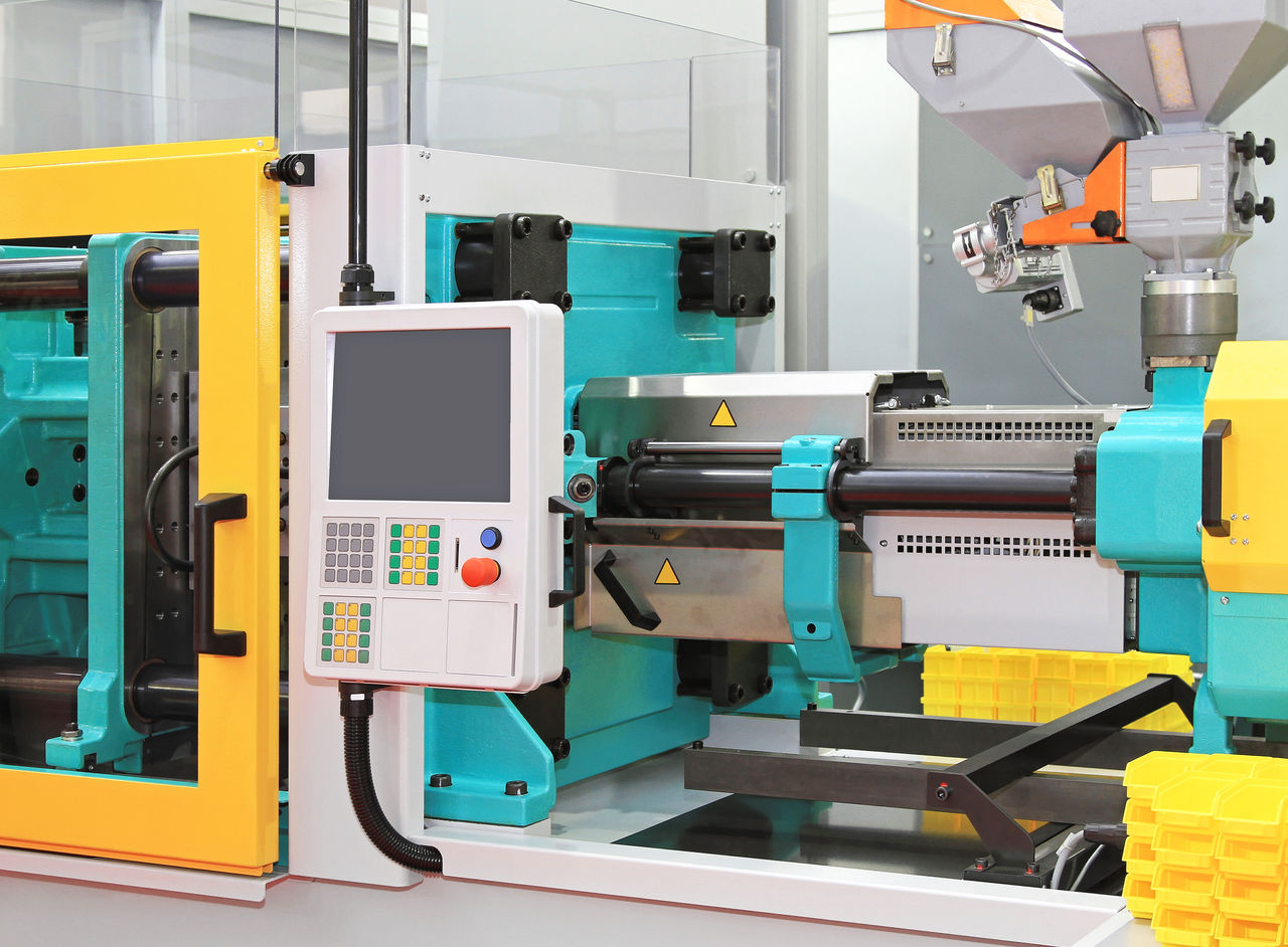 Injection moulding machine for plastic parts production; Shutterstock ID 213338074; purchase_order: POL_Omyasphere ; job: Omyasphere 900 flyer; client: ; other: 